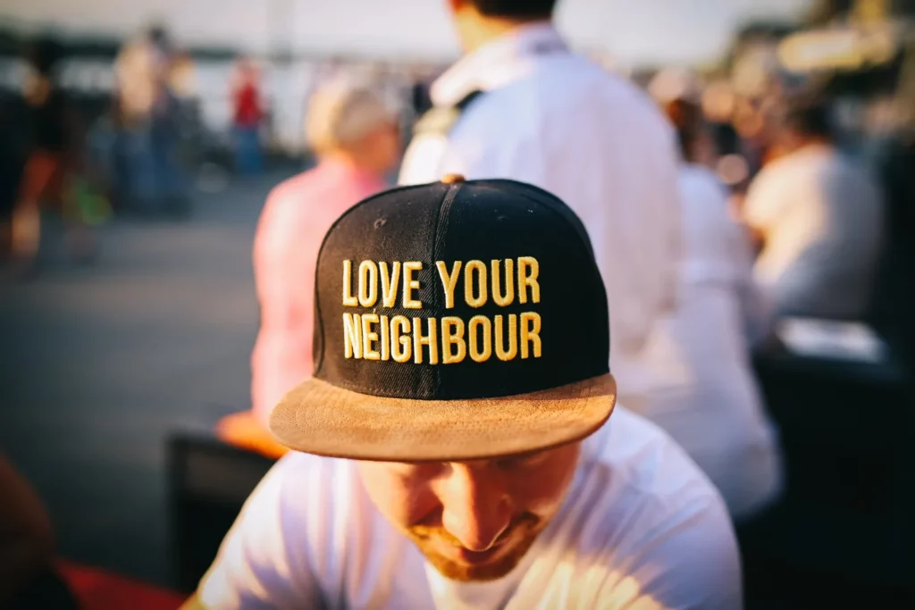 love your neighbour hat